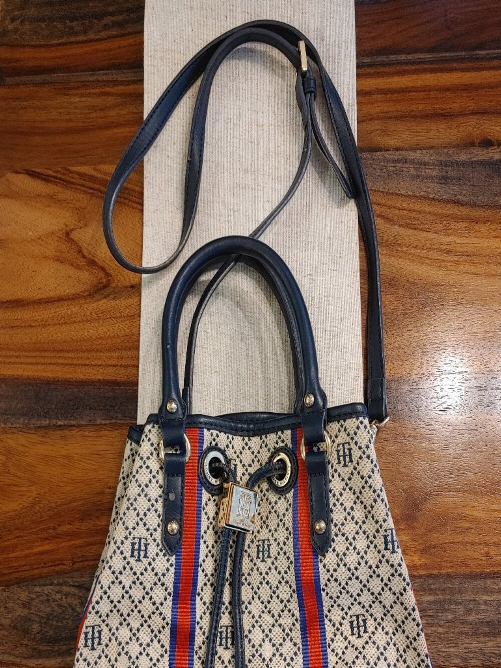 Tommy Hilfiger Mara Monogram Drawstring Bucket Bag – Navy, Cream, & Red